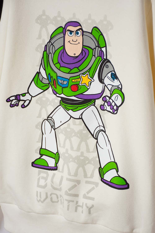 CONJUNTO DE TOY STORY CON JOGGER MARFIL Y NEGRO PARA NIÑO