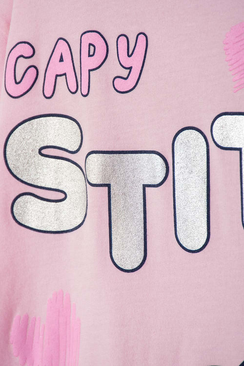 POLERA DE STITCH Y CAPYBARA MANGA CORTA ROSADA PARA NIÑA