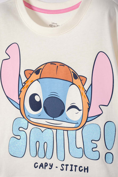 POLERA DE STITCH Y CAPYBARA MANGA CORTA MARFIL PARA NIÑA