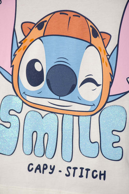 POLERA DE STITCH Y CAPYBARA MANGA CORTA MARFIL PARA NIÑA